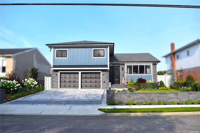 view of front of property featuring a garage