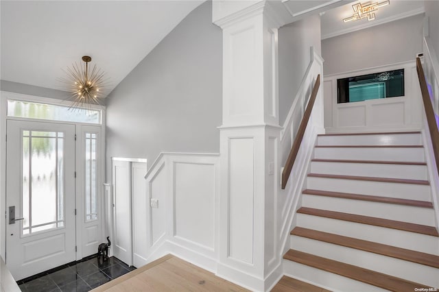 entrance foyer featuring lofted ceiling