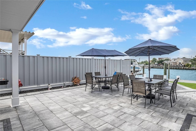 view of patio / terrace with a water view