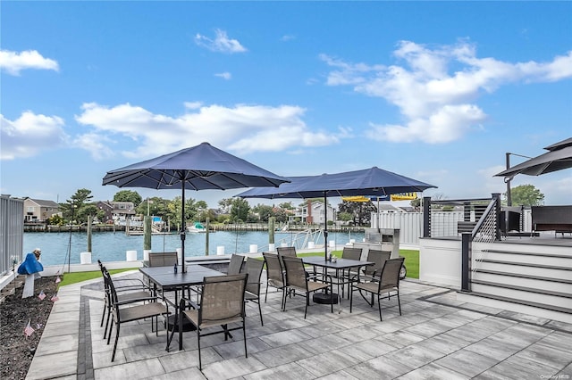 view of patio / terrace featuring a water view