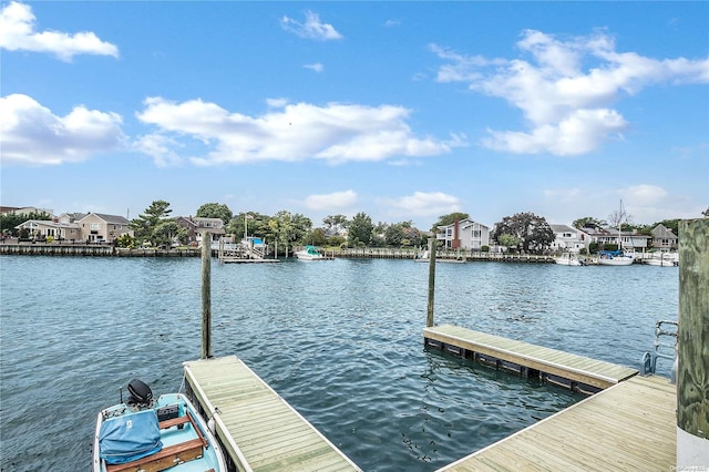 dock area with a water view