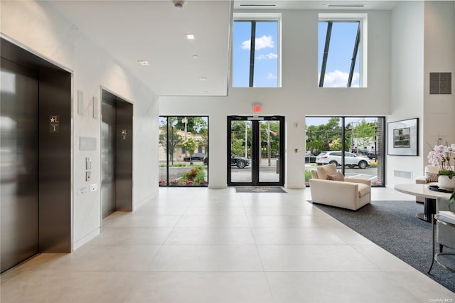 218 Middle Neck Rd Unit 107, Great Neck, NY 11021 - community lobby with a towering ceiling