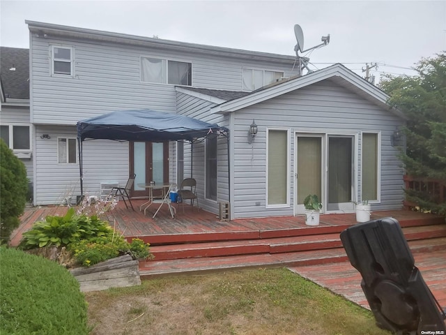 rear view of property with a deck