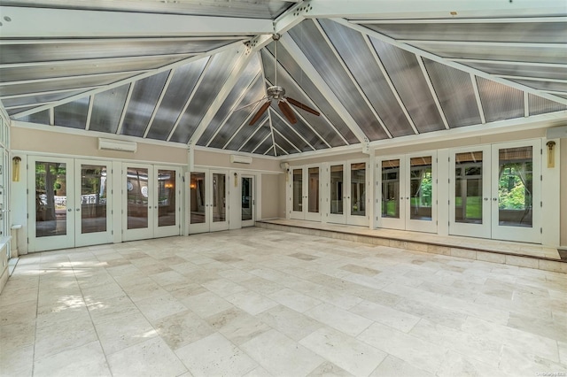 unfurnished sunroom with lofted ceiling, ceiling fan, french doors, and a wall mounted air conditioner