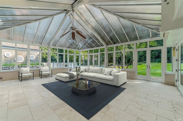 unfurnished sunroom featuring ceiling fan