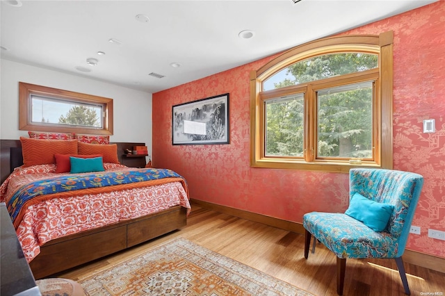 bedroom featuring light wood-type flooring