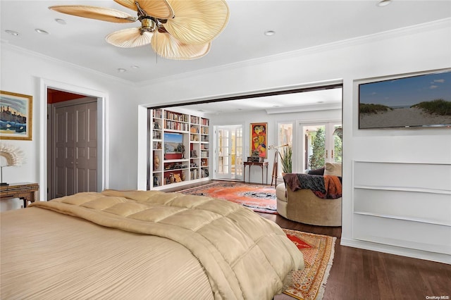 bedroom featuring ceiling fan, french doors, wood-type flooring, and ornamental molding