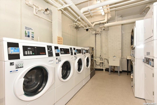 laundry room featuring independent washer and dryer and stacked washing maching and dryer