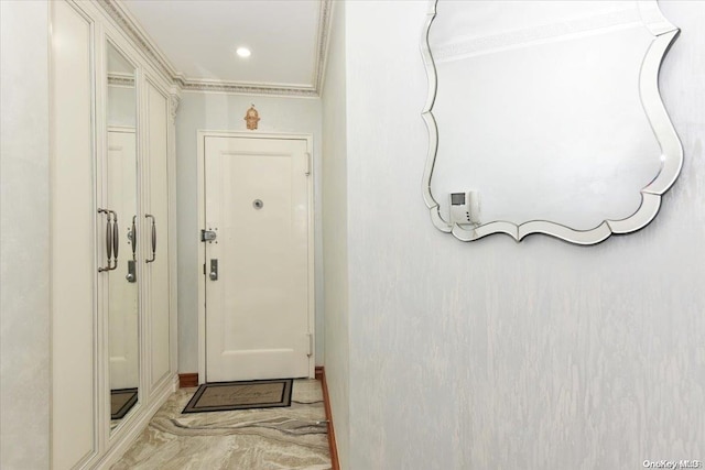 doorway to outside with crown molding