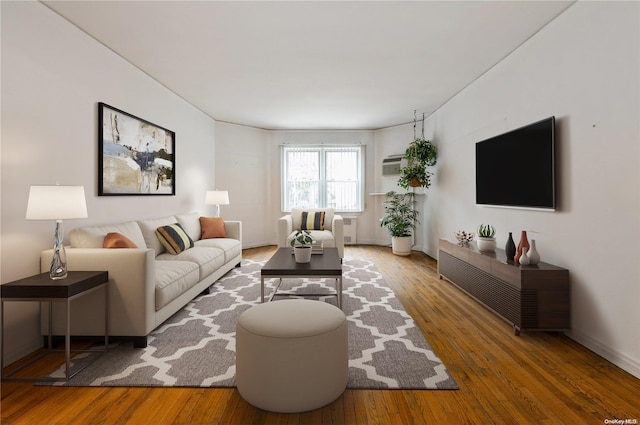 living room with hardwood / wood-style floors and radiator