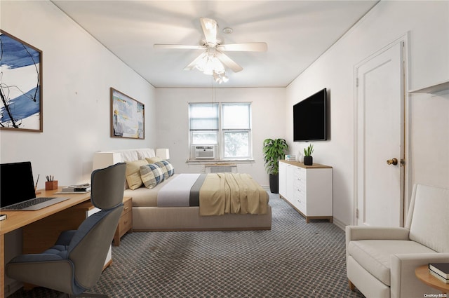 carpeted bedroom with ceiling fan and cooling unit