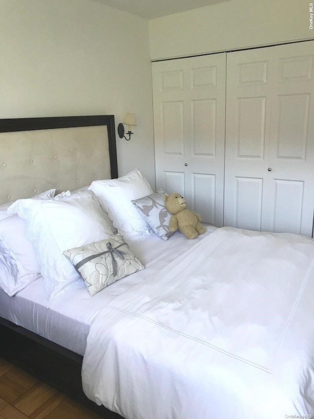 102-10 66th Rd Unit 4G, Forest Hills, NY 11375 - bedroom featuring hardwood / wood-style flooring and a closet