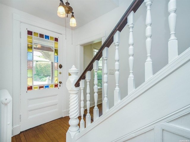 entryway with wood-type flooring