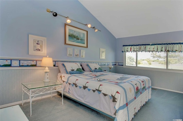 carpeted bedroom featuring vaulted ceiling