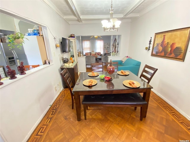 dining space with an inviting chandelier, parquet floors, and ornamental molding