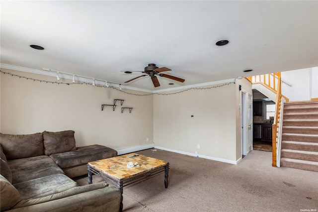 carpeted living room featuring a baseboard radiator and ceiling fan