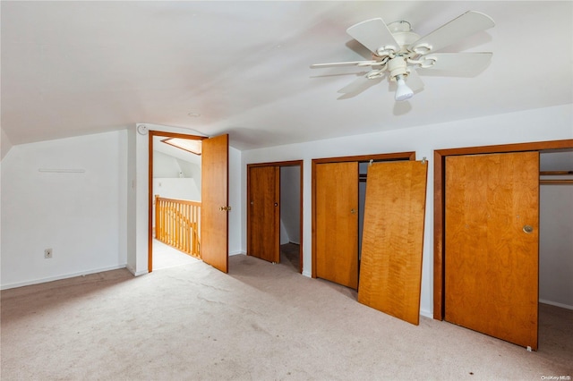 bonus room with light carpet, vaulted ceiling, and ceiling fan