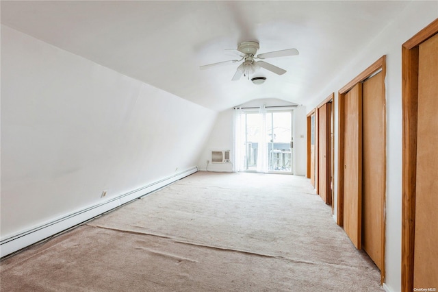 bonus room featuring a wall mounted air conditioner, lofted ceiling, light carpet, ceiling fan, and baseboard heating