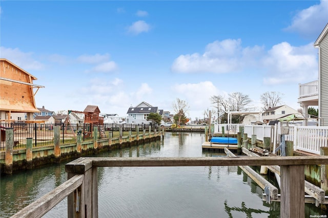 dock area featuring a water view