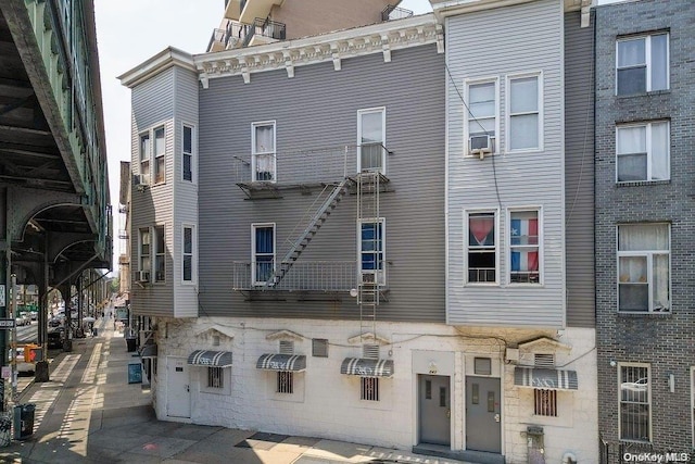 rear view of house with cooling unit