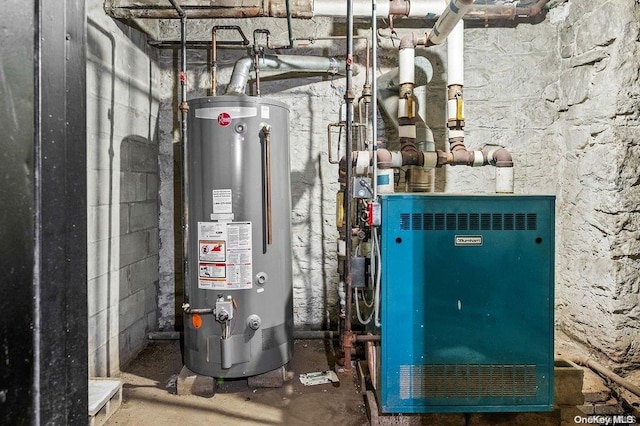 utility room with gas water heater