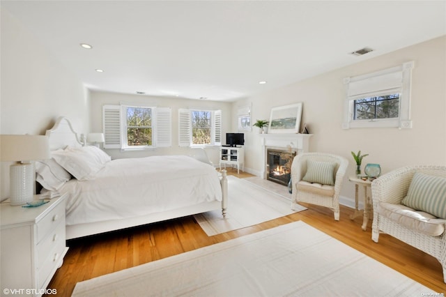 bedroom with light hardwood / wood-style floors