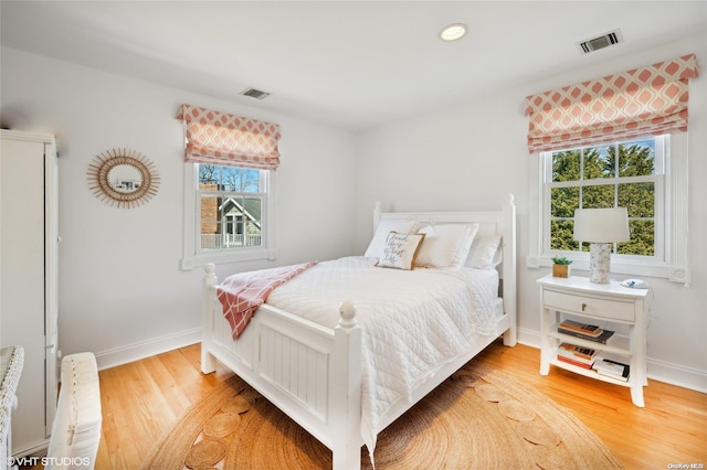 bedroom featuring hardwood / wood-style floors