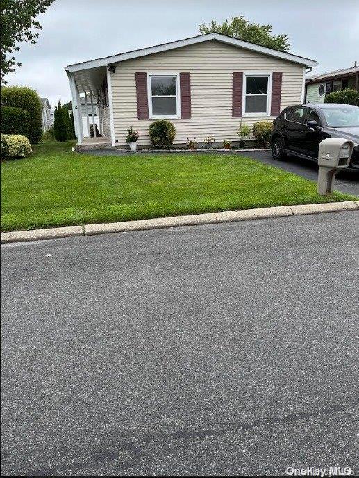 view of front of house with a front yard