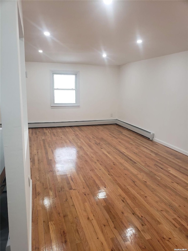 spare room featuring light hardwood / wood-style flooring