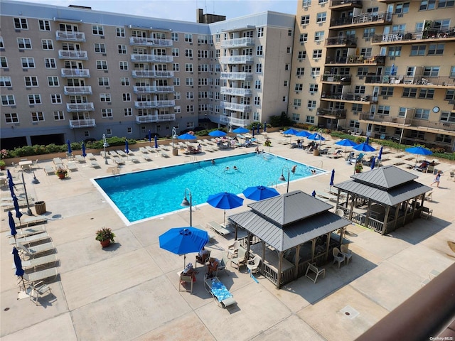 view of pool featuring a gazebo and a patio