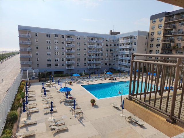 view of pool featuring a patio