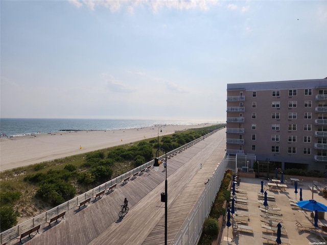 property view of water featuring a beach view