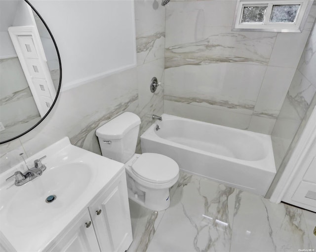 full bathroom featuring vanity, toilet, and tiled shower / bath combo