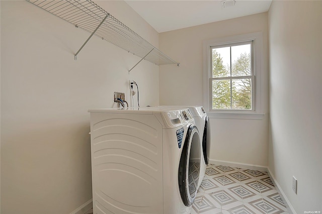 washroom featuring separate washer and dryer