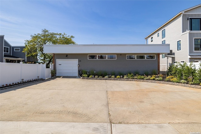 view of front of home featuring a garage