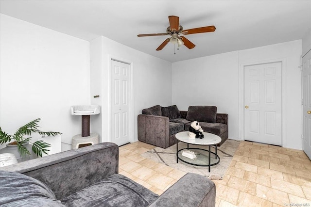 living room with ceiling fan