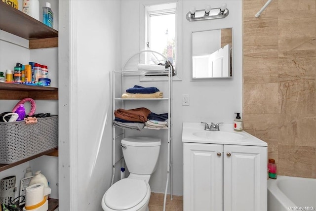 full bathroom with vanity, toilet, and tiled shower / bath combo