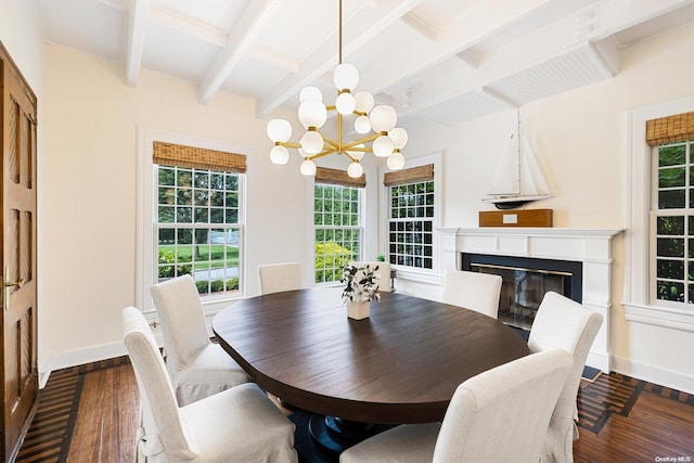 dining space featuring beamed ceiling, dark wood-type flooring, and a chandelier