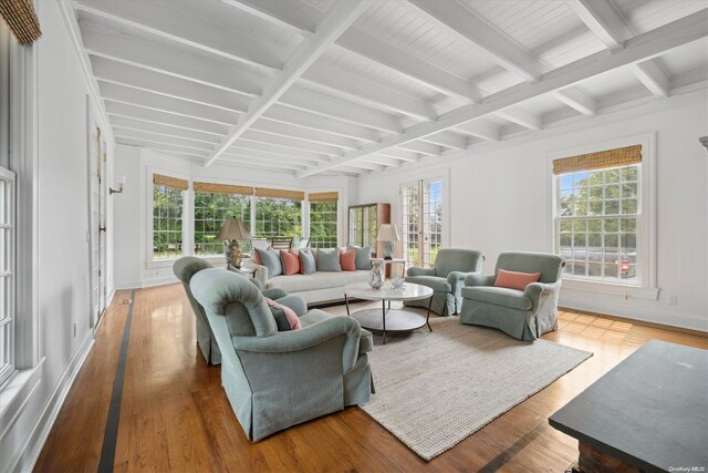 sunroom with beam ceiling