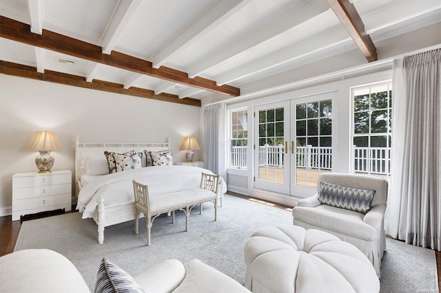 bedroom with access to exterior, french doors, beamed ceiling, and wood-type flooring