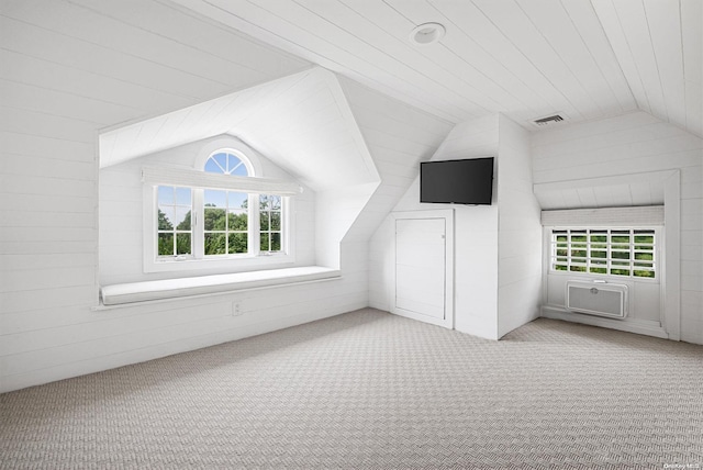 bonus room with plenty of natural light, lofted ceiling, and wood ceiling