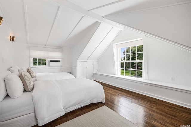 bedroom featuring dark hardwood / wood-style flooring, cooling unit, multiple windows, and lofted ceiling