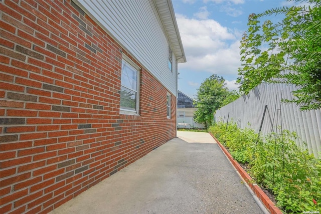 view of home's exterior with a patio area