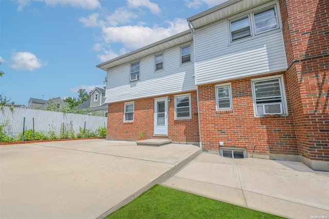 rear view of property with a patio