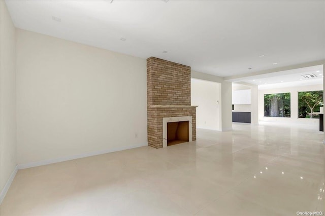 unfurnished living room with a fireplace