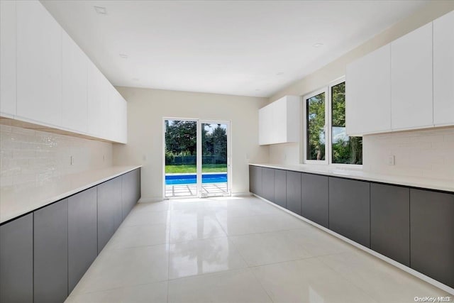 interior space with light tile patterned floors