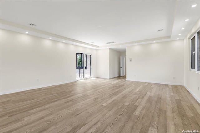 empty room with light wood-type flooring