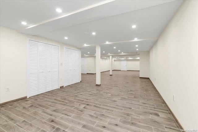 basement featuring light wood-type flooring