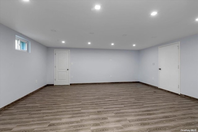 basement featuring light hardwood / wood-style flooring