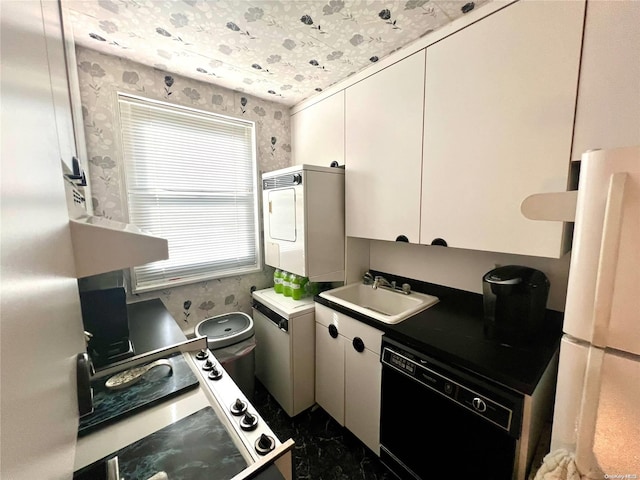 kitchen with white cabinetry, dishwasher, sink, stacked washer / dryer, and white fridge